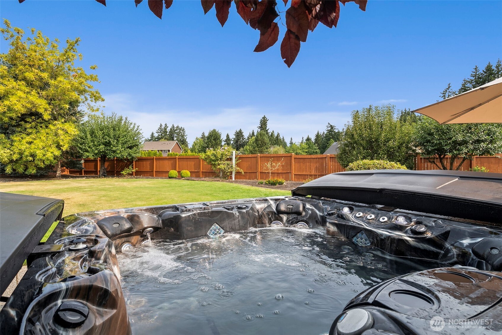 9609 346th Street South Roy, WA 98580 - Photo 31 of 37 a view of a swimming pool with a yard