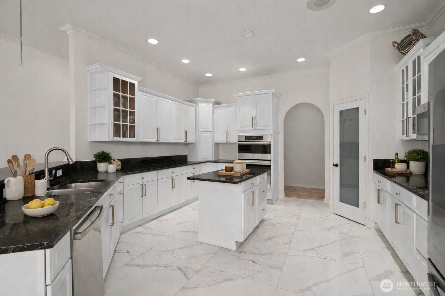 9609 346th Street South Roy, WA 98580 - Photo 7 of 31 a kitchen with stainless steel appliances granite countertop a sink a stove and cabinets