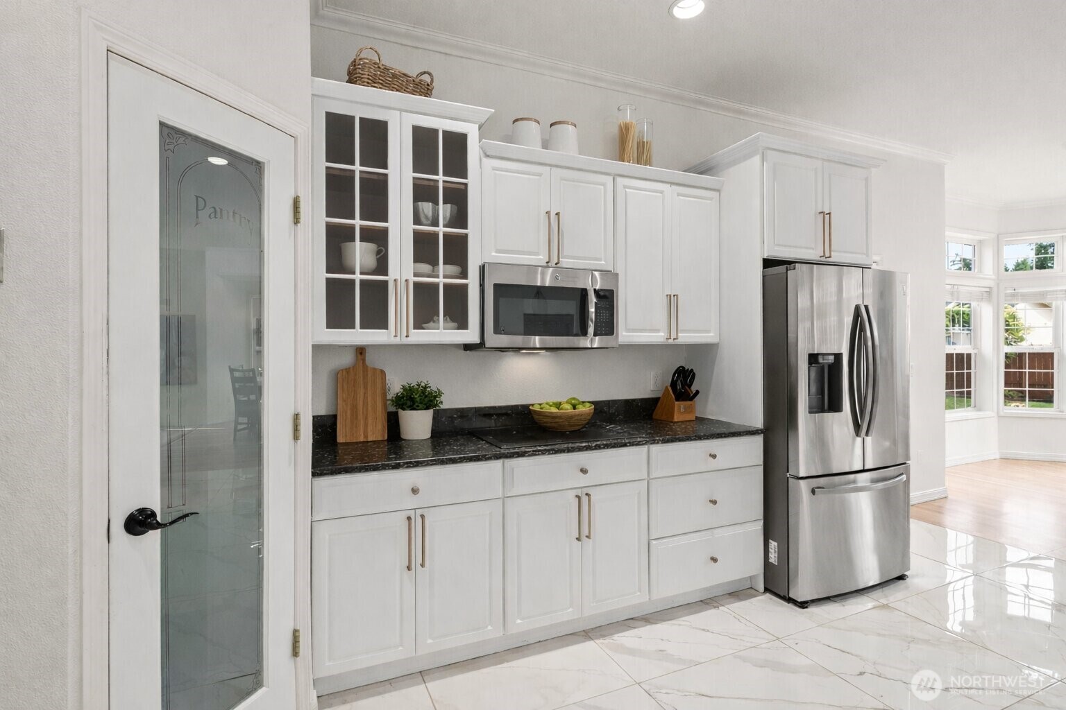 9609 346th Street South Roy, WA 98580 - Photo 8 of 31 a kitchen with stainless steel appliances a refrigerator sink and cabinets