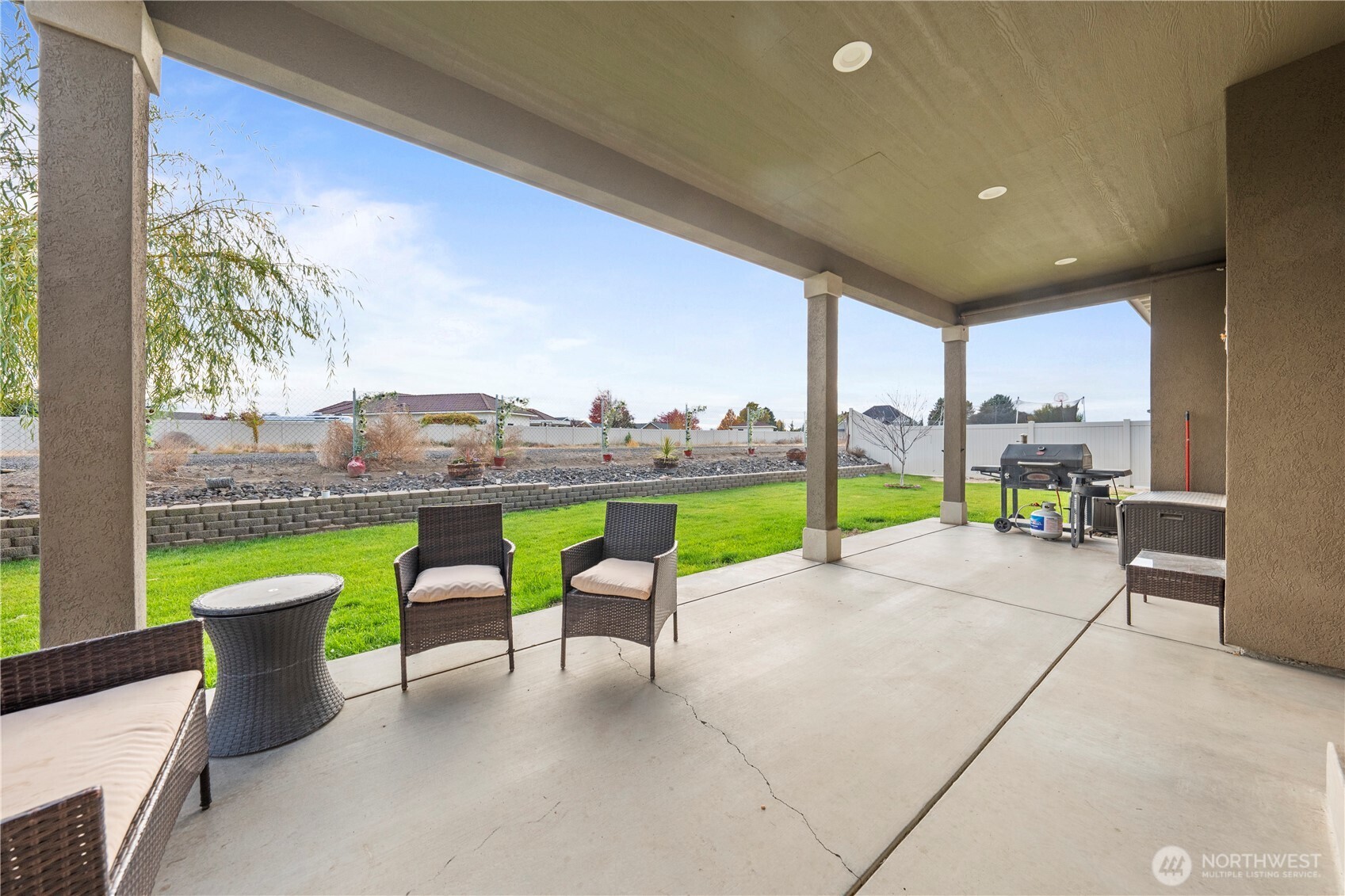1830 East Madera Street Othello, WA 99344 - Photo 12 of 35 a view of a swimming pool and outdoor seating
