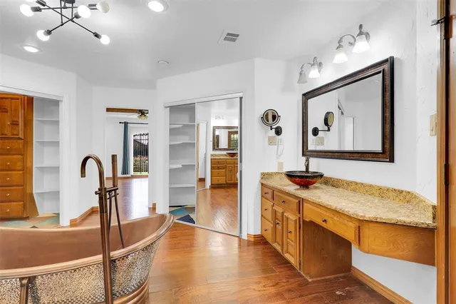 a view of a living room and bathroom