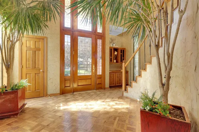 a view of backyard with outdoor seating and a potted plants