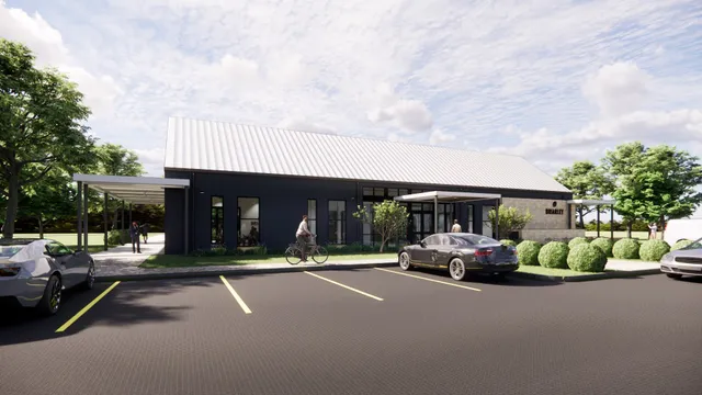 a car parked in front of a house
