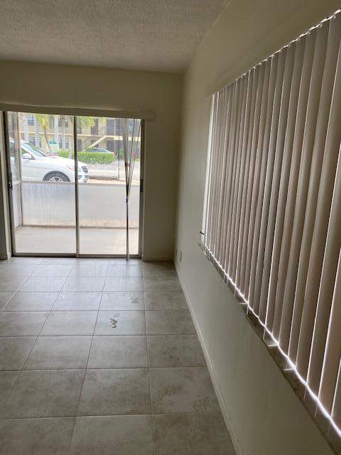 521 Northeast 45th Street, Unit 1 Boca Raton, FL 33431 - Photo 6 of 15 Living/Patio