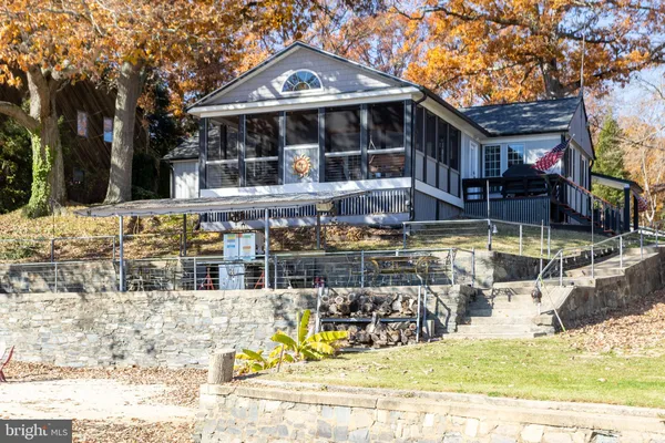 a view of a house with swimming pool
