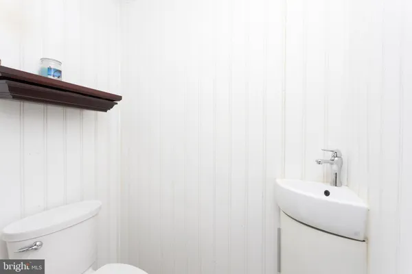a bathroom with a sink and a toilet