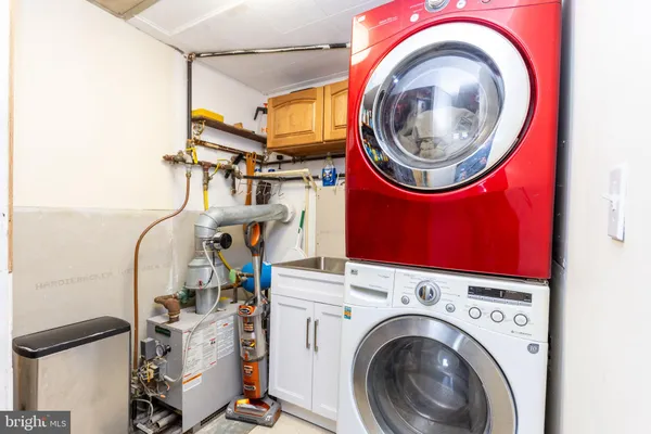 a view of washer and dryer in a utility room