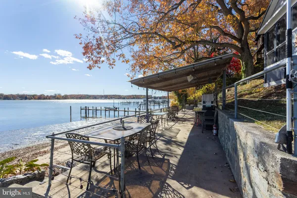 a view of a chairs and table on the terrace