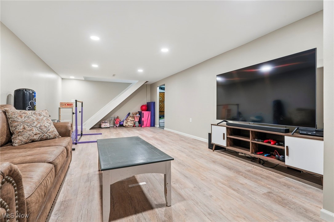 7153 Hudson Road Kent, OH 44240 - Photo 31 of 46 Living area featuring recessed lighting and light wood-style flooring