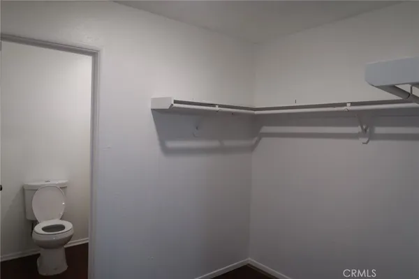 a bathroom with a toilet and a sink