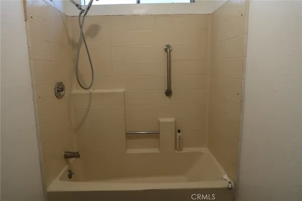 a bathroom with a bath tub