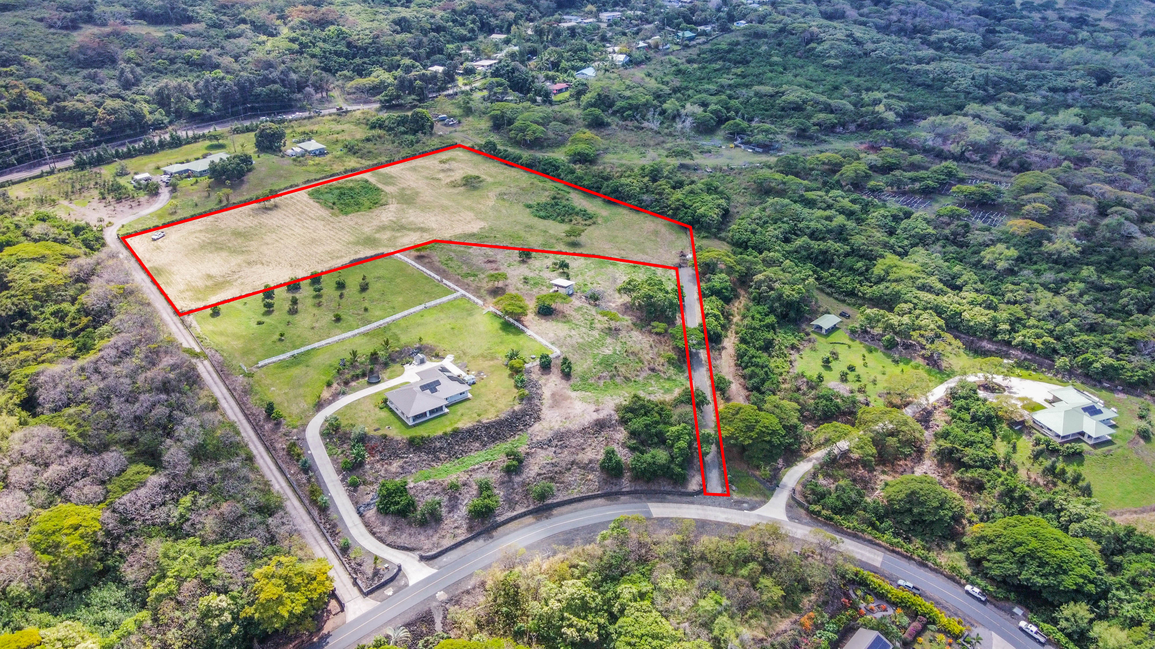 85-5195 Kiilae Road Captain Cook, HI 96704 - Photo 4 of 20 an aerial view of a tennis ground and large trees