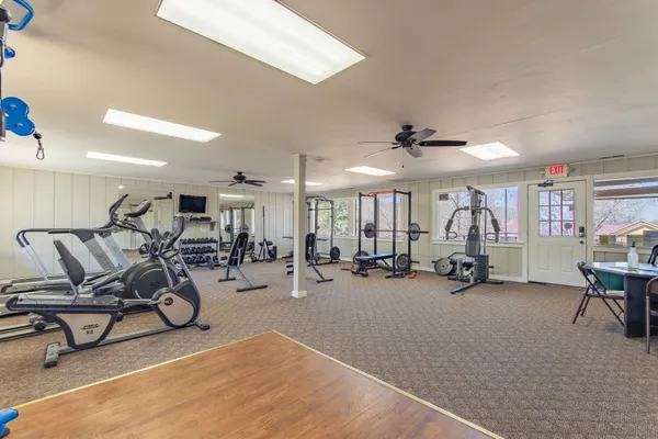 a view of a room with gym equipment