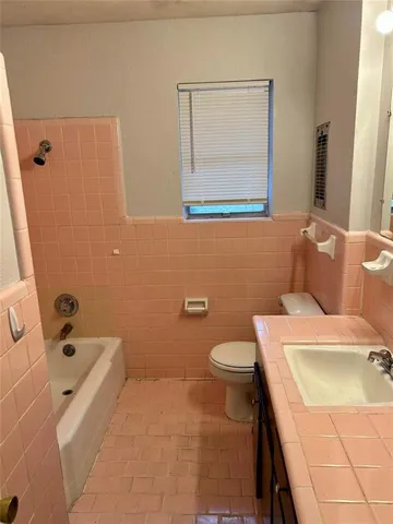 a bathroom with a sink and a toilet