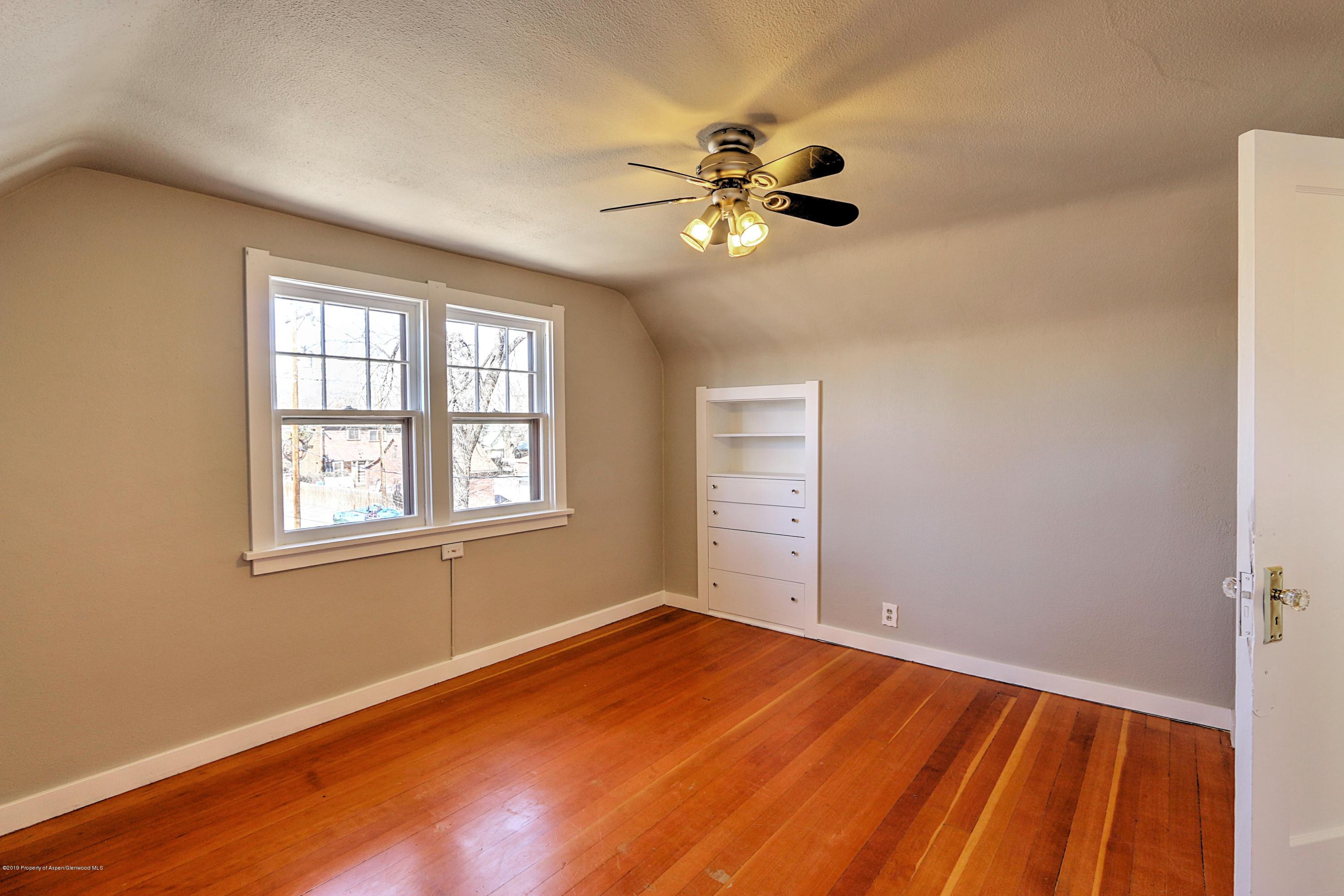 721 East Avenue Rifle, CO 81650 - Photo 21 of 24 a view of an empty room with a window