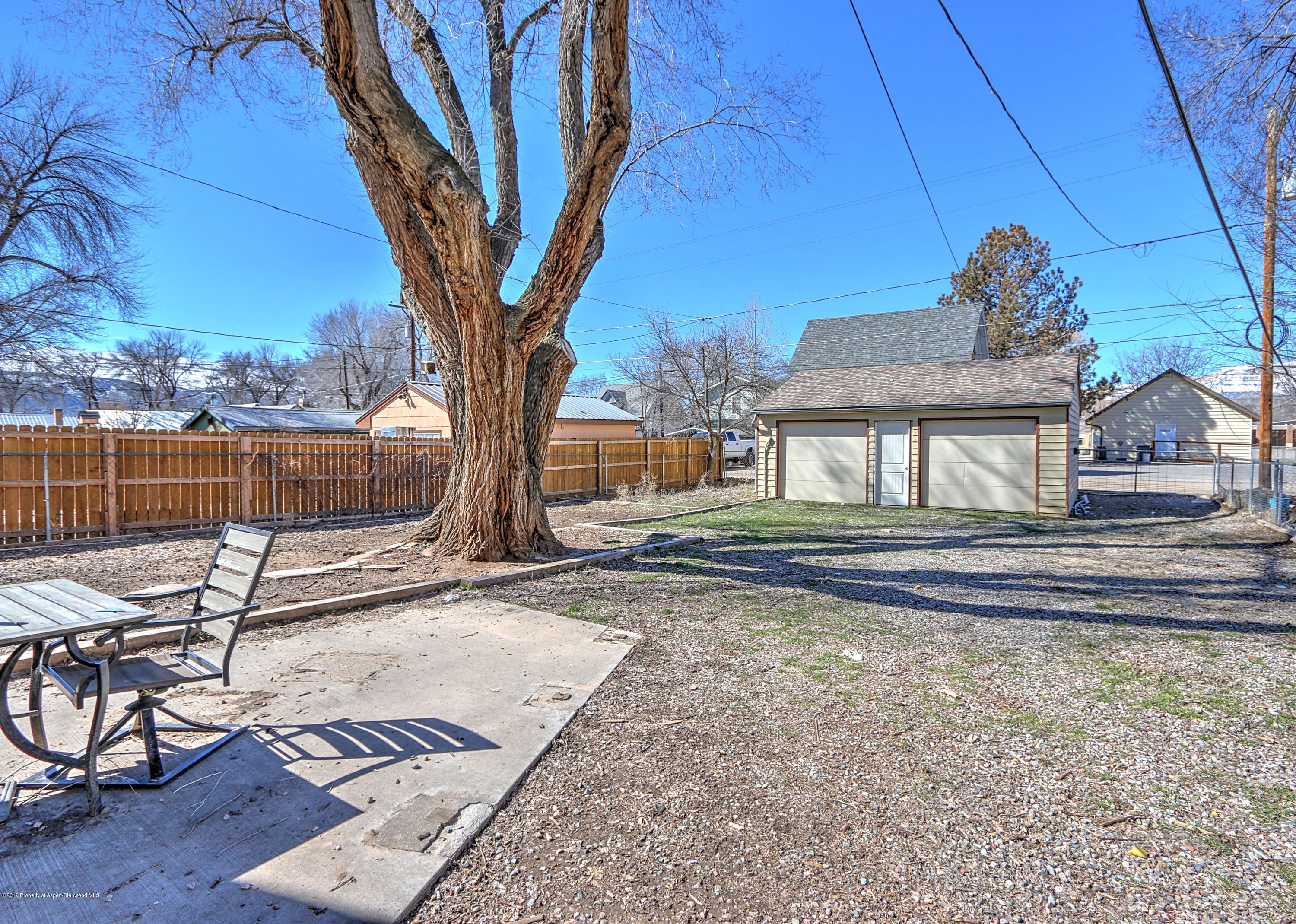 721 East Avenue Rifle, CO 81650 - Photo 24 of 24 a view of a house with backyard and sitting area