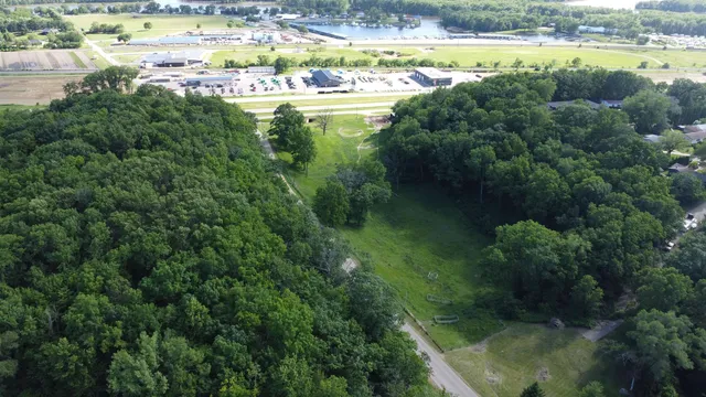 a view of a lake with a yard