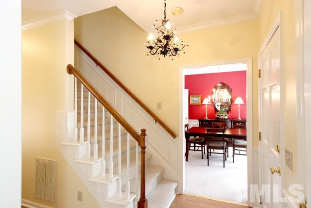 4440 Oak Park Road Raleigh, NC 27612 - Photo 3 of 25 Entrance foyer with doors to dining room