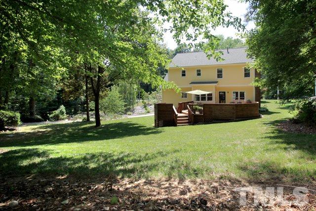 4440 Oak Park Road Raleigh, NC 27612 - Photo 23 of 25 View of the rear of home from the back yard