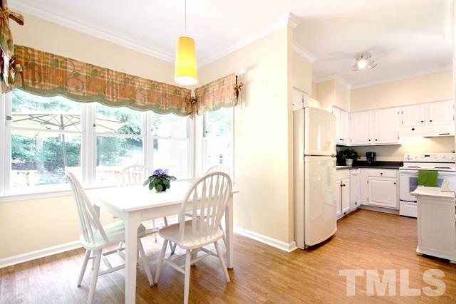 4440 Oak Park Road Raleigh, NC 27612 - Photo 7 of 25 Breakfast room opens to kitchen