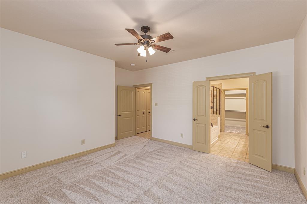 1871 Signal Ridge Place Rockwall, TX 75032 - Photo 15 of 26 a view of an empty room with a window