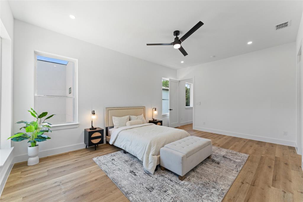 2826 Rochester Street Dallas, TX 75215 - Photo 17 of 38 Bedroom with a ceiling fan, light wood-style floors, and recessed lighting