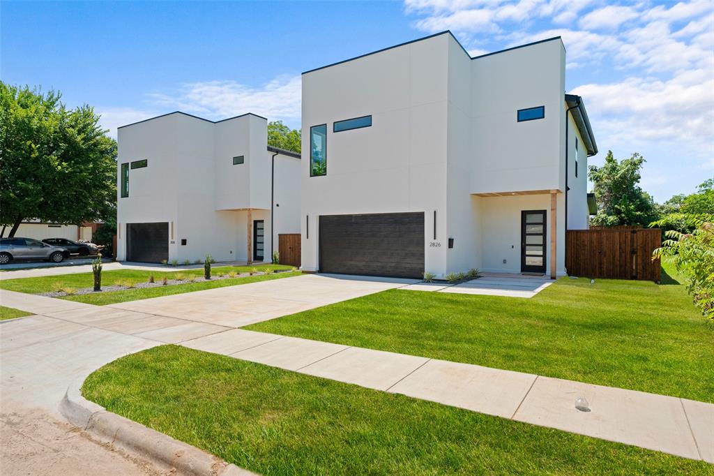 2826 Rochester Street Dallas, TX 75215 - Photo 3 of 38 Contemporary home with stucco siding, an attached garage, and concrete driveway