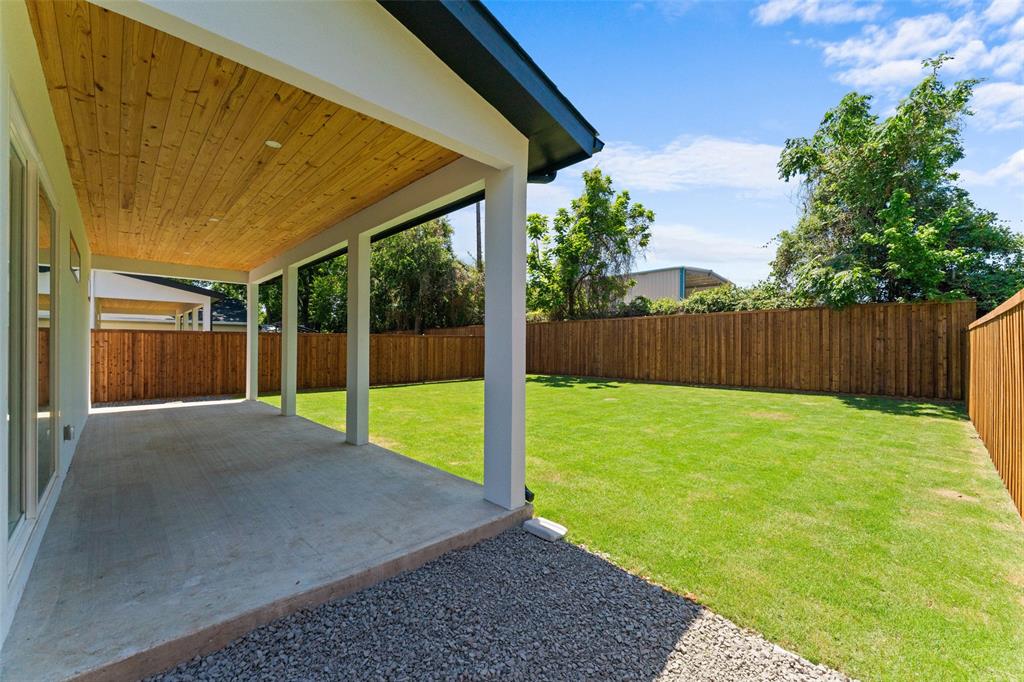 2826 Rochester Street Dallas, TX 75215 - Photo 31 of 38 Fenced backyard featuring a patio area