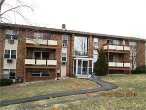 45 Jefferson Road, Unit 515 Branford, CT 06405 - Photo 1 of 1 a front view of a house with a yard