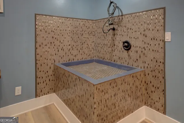 a view of a golf course with a lake