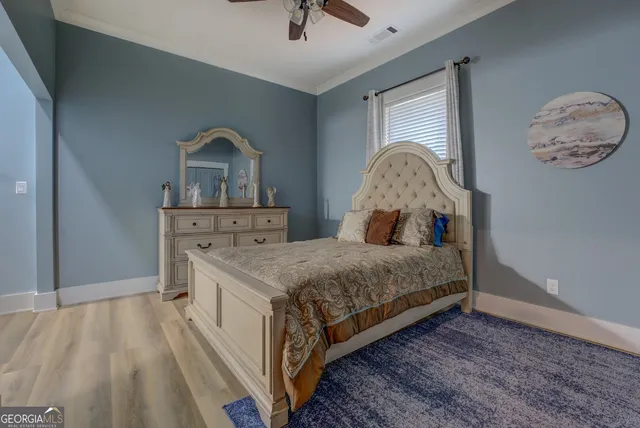 an aerial view of a house with swimming pool and big yard