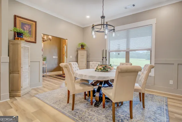 a view of a dining room with furniture