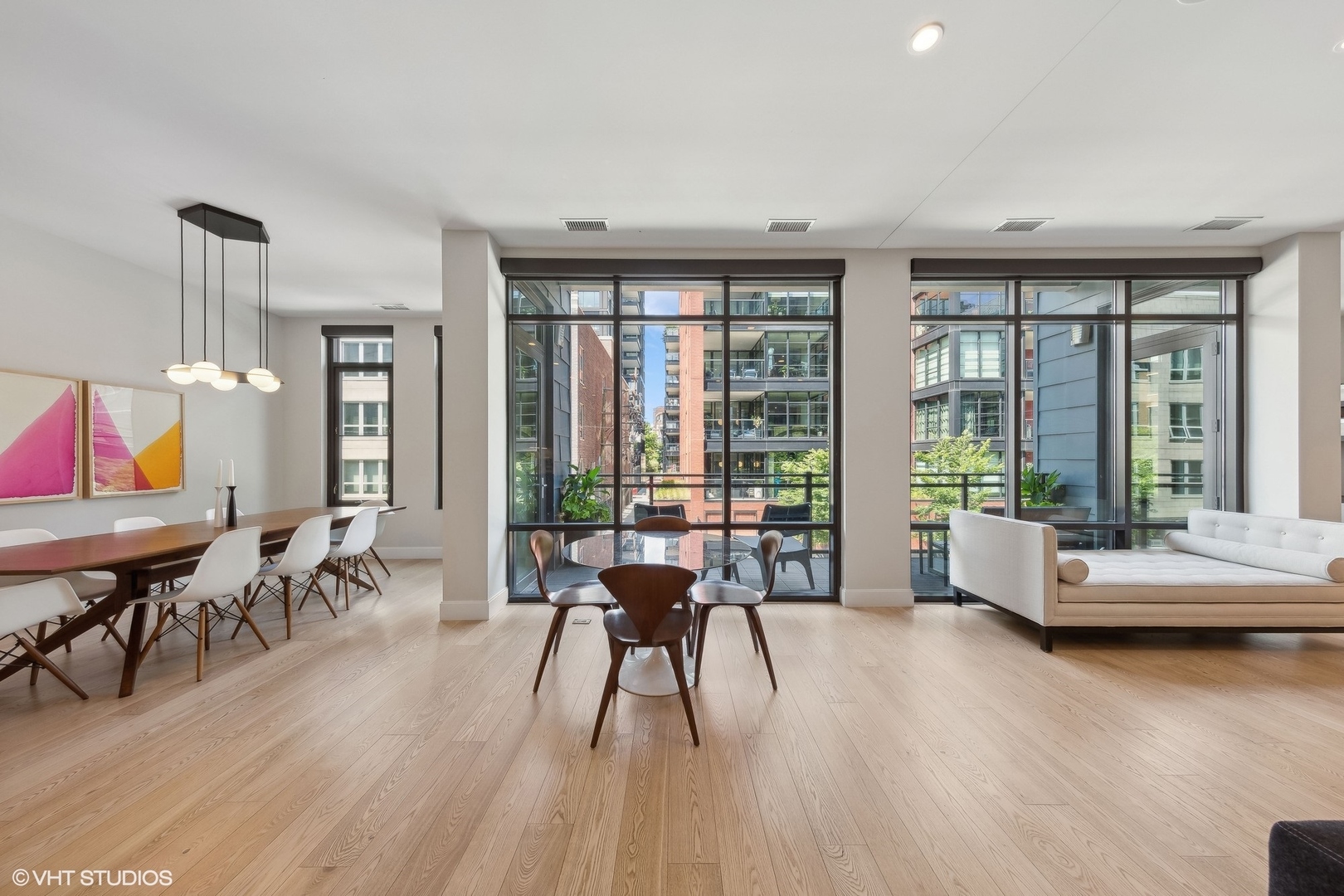 35 North Aberdeen Street, Unit 2S Chicago, IL 60607 - Photo 11 of 46 a living room with furniture and floor to ceiling windows