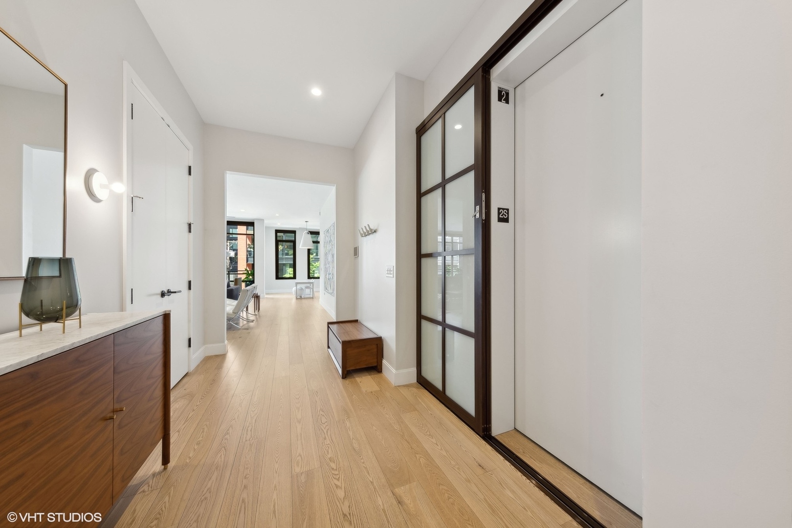 35 North Aberdeen Street, Unit 2S Chicago, IL 60607 - Photo 17 of 46 wooden floor in an empty room