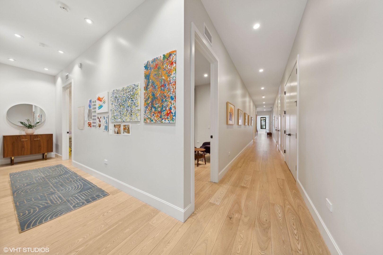 35 North Aberdeen Street, Unit 2S Chicago, IL 60607 - Photo 21 of 46 a view of a hallway view with wooden floor and staircase
