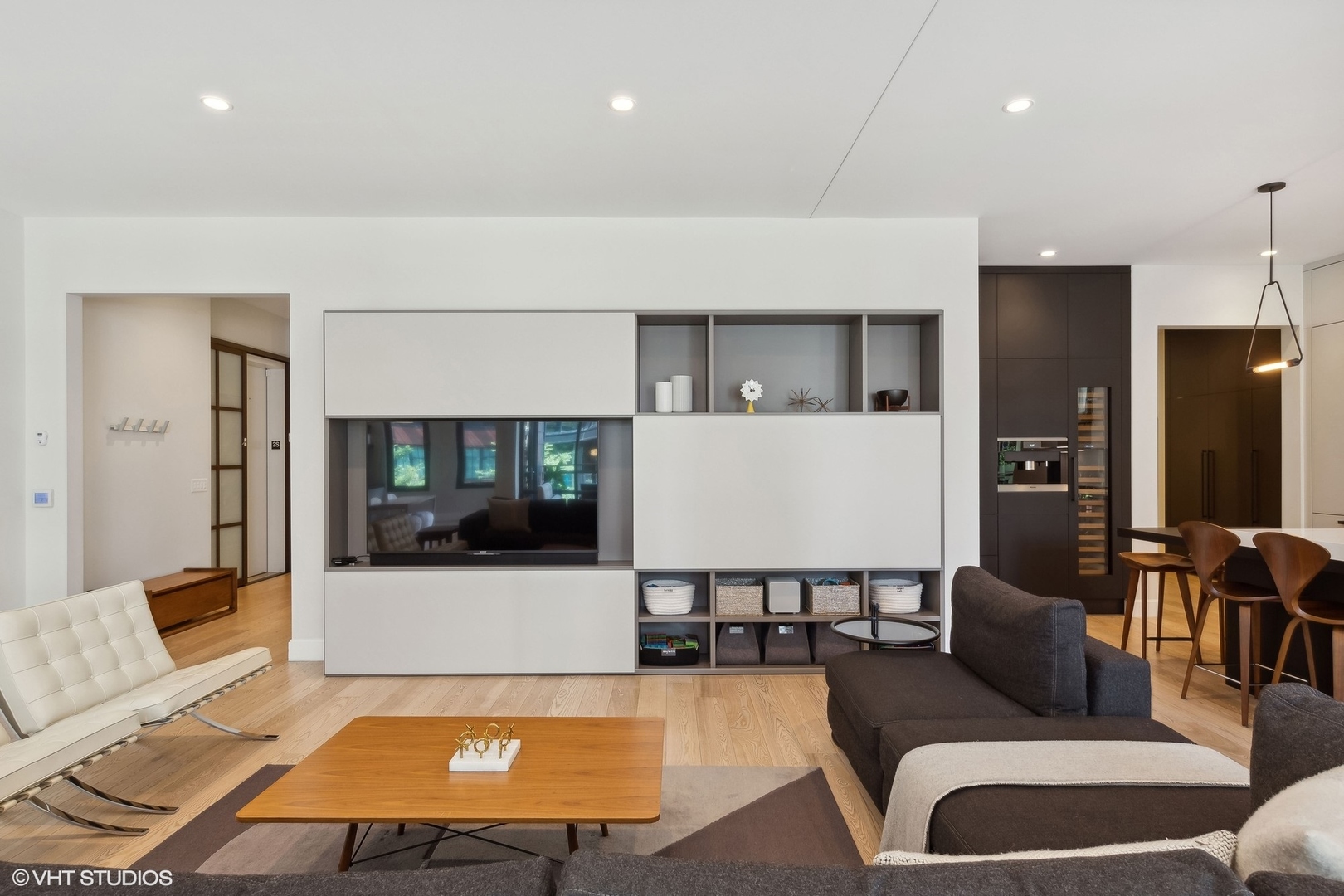 35 North Aberdeen Street, Unit 2S Chicago, IL 60607 - Photo 3 of 46 a living room with furniture and a flat screen tv