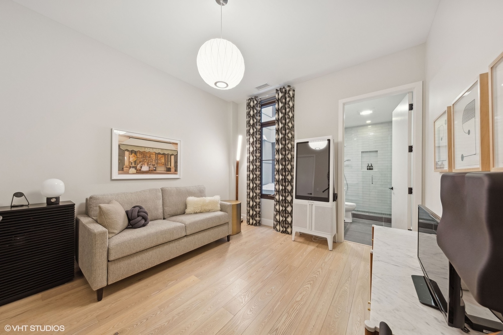 35 North Aberdeen Street, Unit 2S Chicago, IL 60607 - Photo 39 of 46 a living room with furniture and a wooden floor
