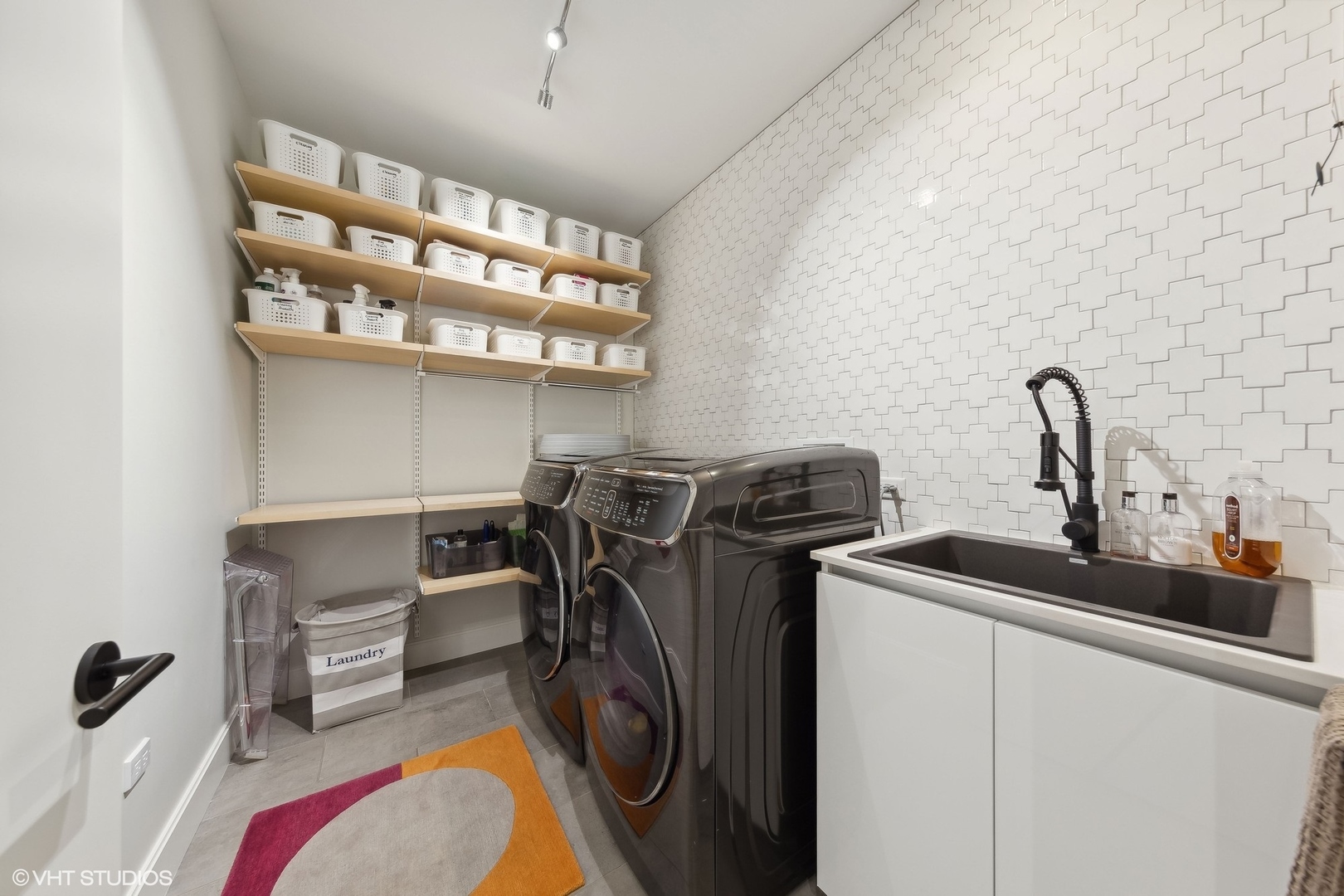 35 North Aberdeen Street, Unit 2S Chicago, IL 60607 - Photo 42 of 46 a view of walk in closet with clothes and shoes