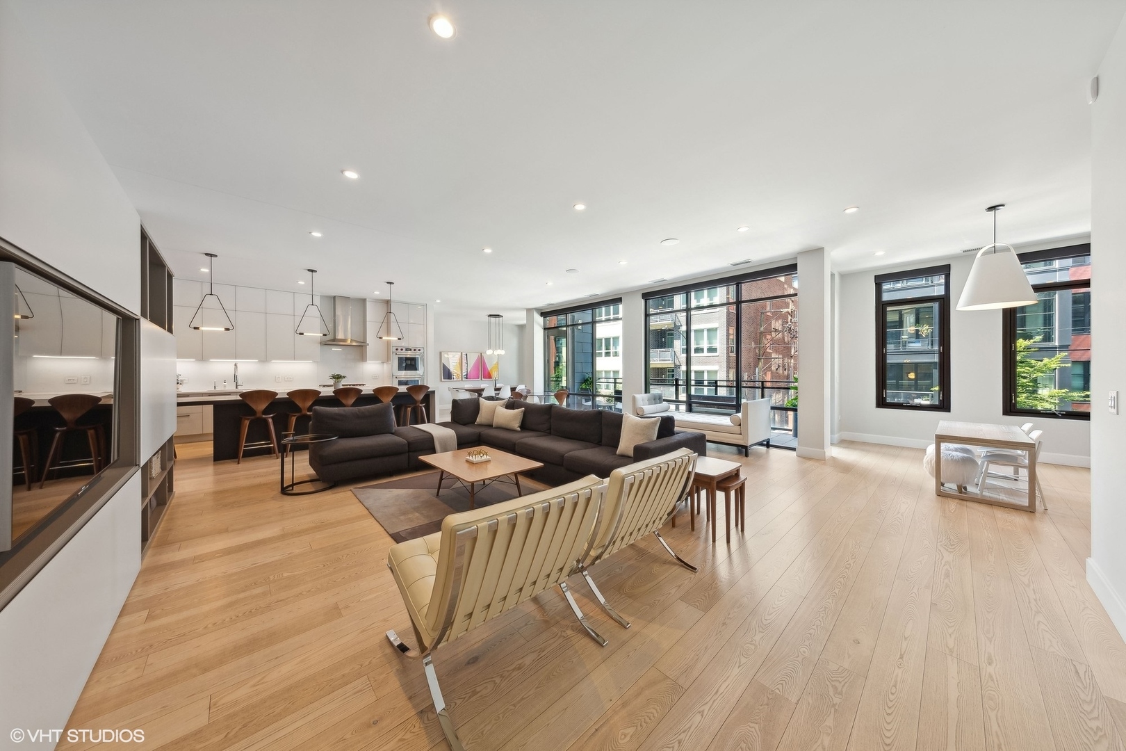 35 North Aberdeen Street, Unit 2S Chicago, IL 60607 - Photo 6 of 46 a living room with furniture wooden floor and a fireplace