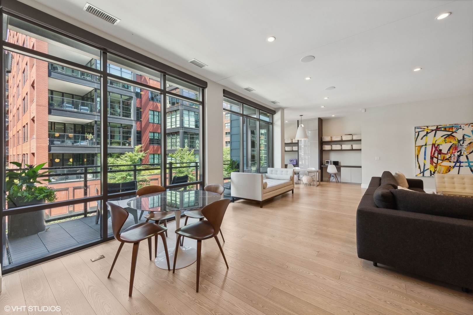 35 North Aberdeen Street, Unit 2S Chicago, IL 60607 - Photo 8 of 46 a living room with furniture and a large window