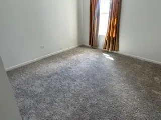 a view of a room with windows