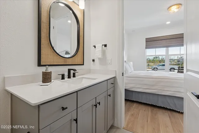 a view of a livingroom with furniture and a window
