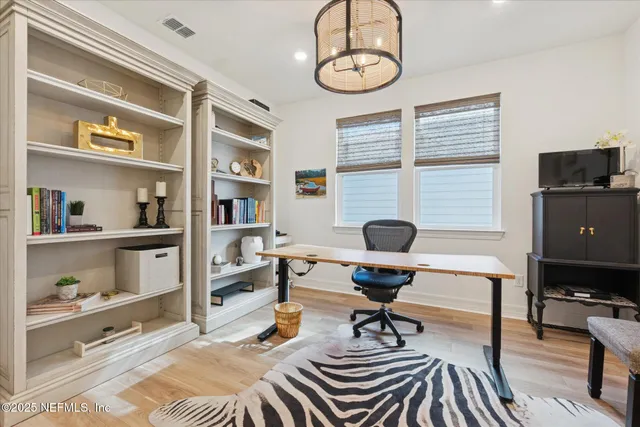 a bathroom with a sink a mirror and a toilet