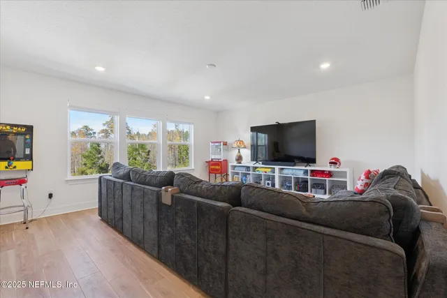 a living room with furniture and a couch