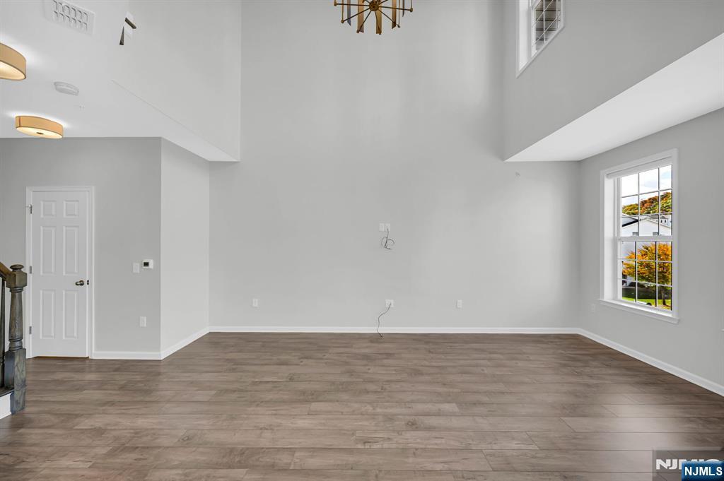 41 Sequoia Drive Cedar Grove, NJ 07009 - Photo 16 of 49 a view of an empty room and window