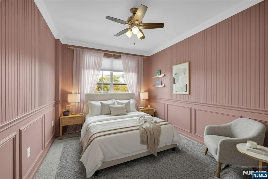 41 Sequoia Drive Cedar Grove, NJ 07009 - Photo 29 of 49 a bedroom with a bed and furniture