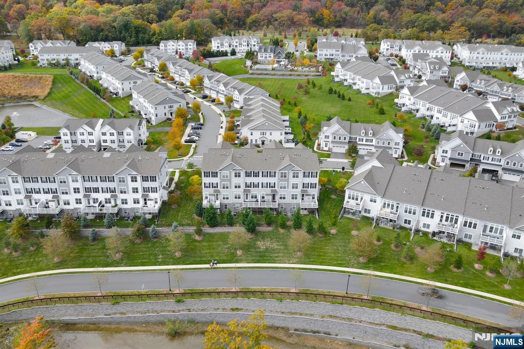 41 Sequoia Drive Cedar Grove, NJ 07009 - Photo 41 of 49 an aerial view of residential houses with outdoor space and river
