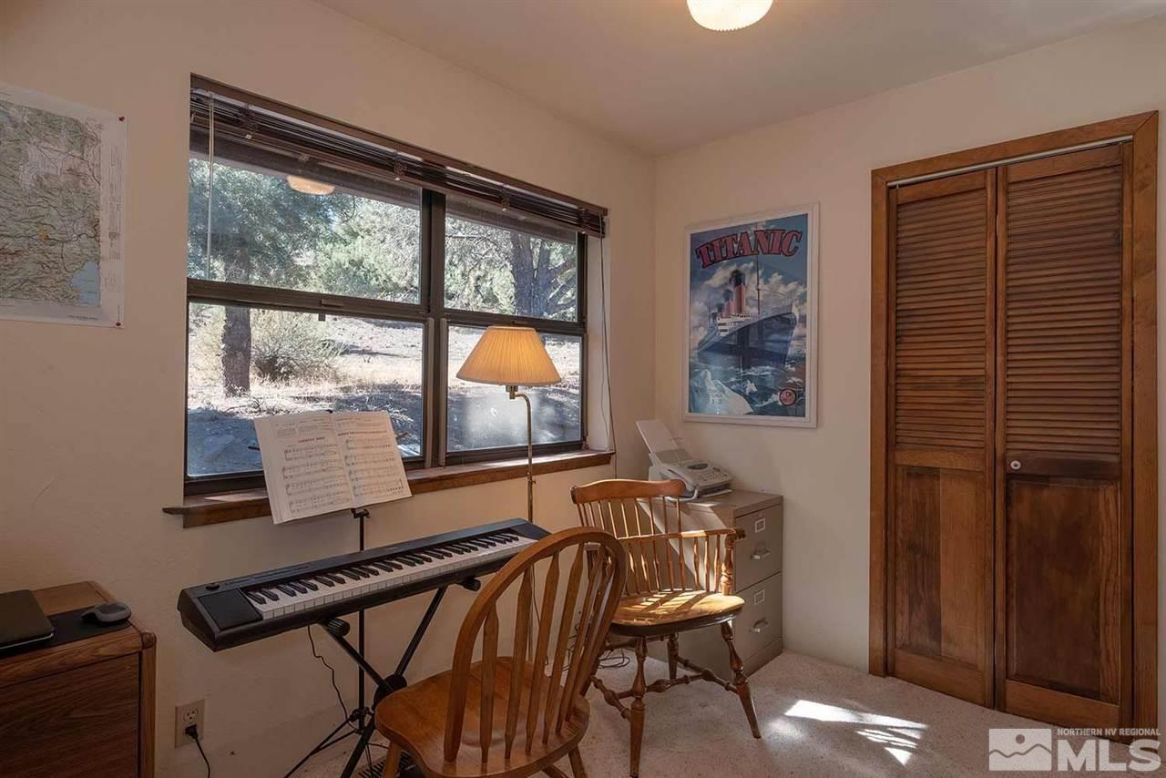 2511 Cartwright Road Reno, NV 89521 - Photo 23 of 24 a room with furniture and a window