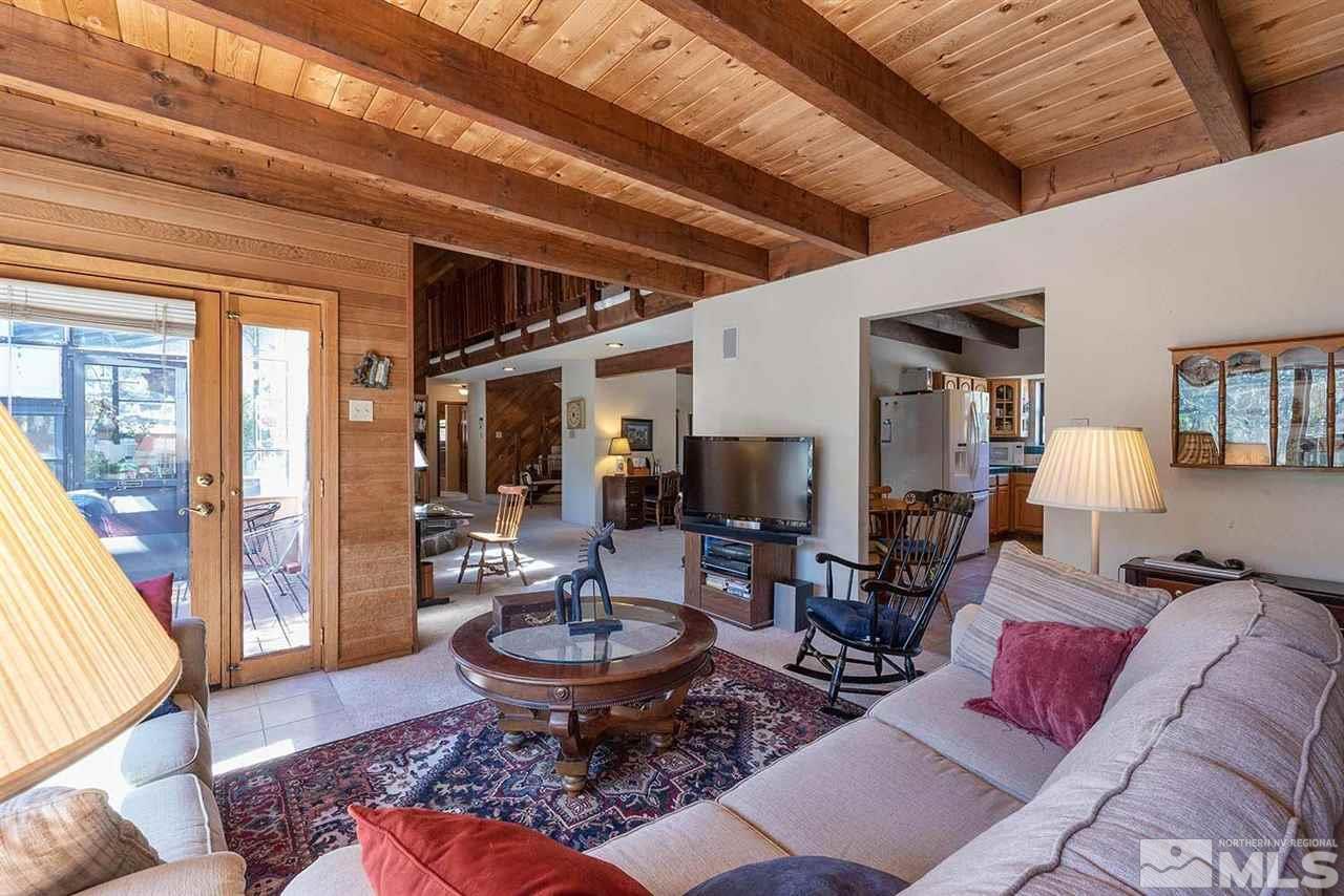 2511 Cartwright Road Reno, NV 89521 - Photo 5 of 24 a living room with furniture a rug and a large window