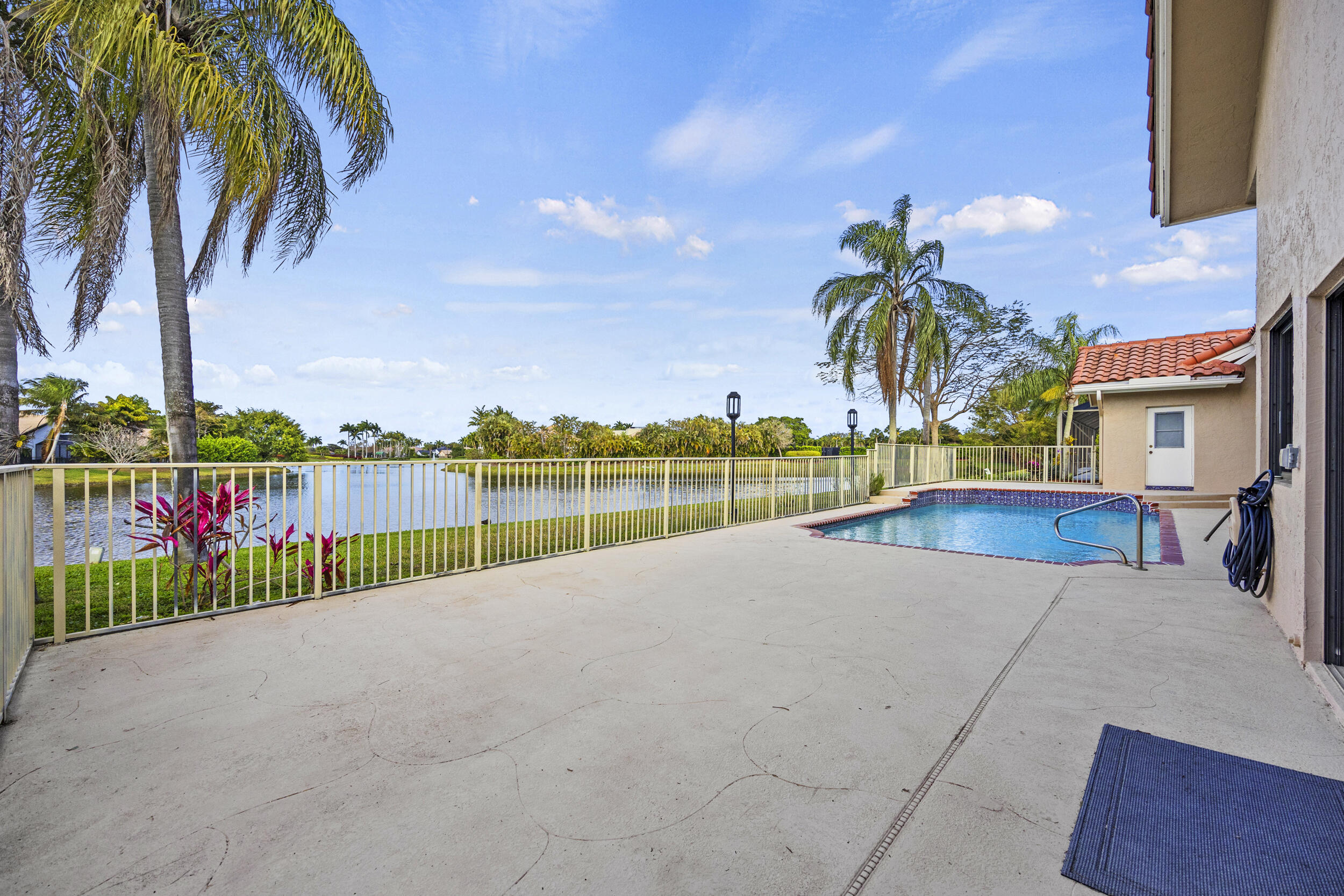 10747 Stonebridge Boulevard Boca Raton, FL 33498 - Photo 49 of 75 a view of swimming pool with outdoor seating and city view